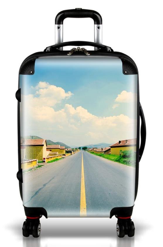 Suitcase printed with a full-wrap landscape graphic