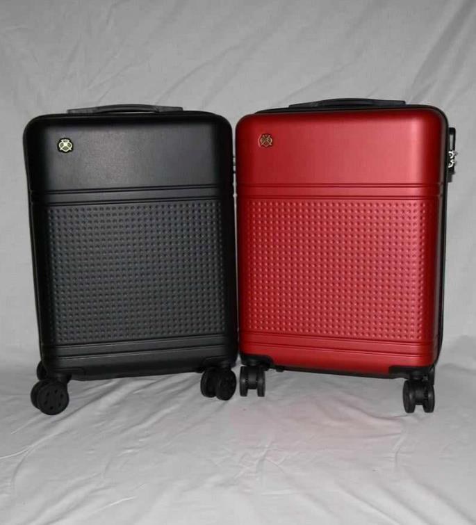 Custom-branded hard-shell spinner luggage in red and black